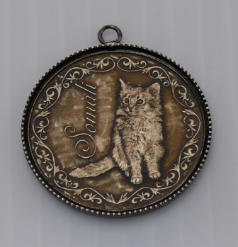猫のメダル